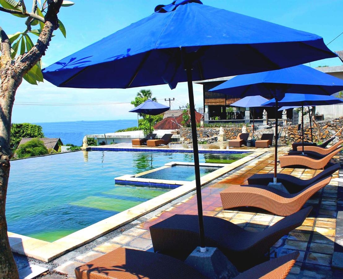The swimming pool at Bali Bhuana Villas overlooking the sea in Amed